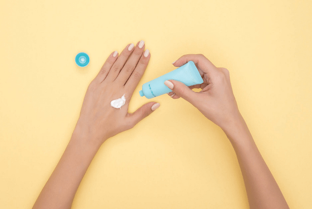 a person testing cream